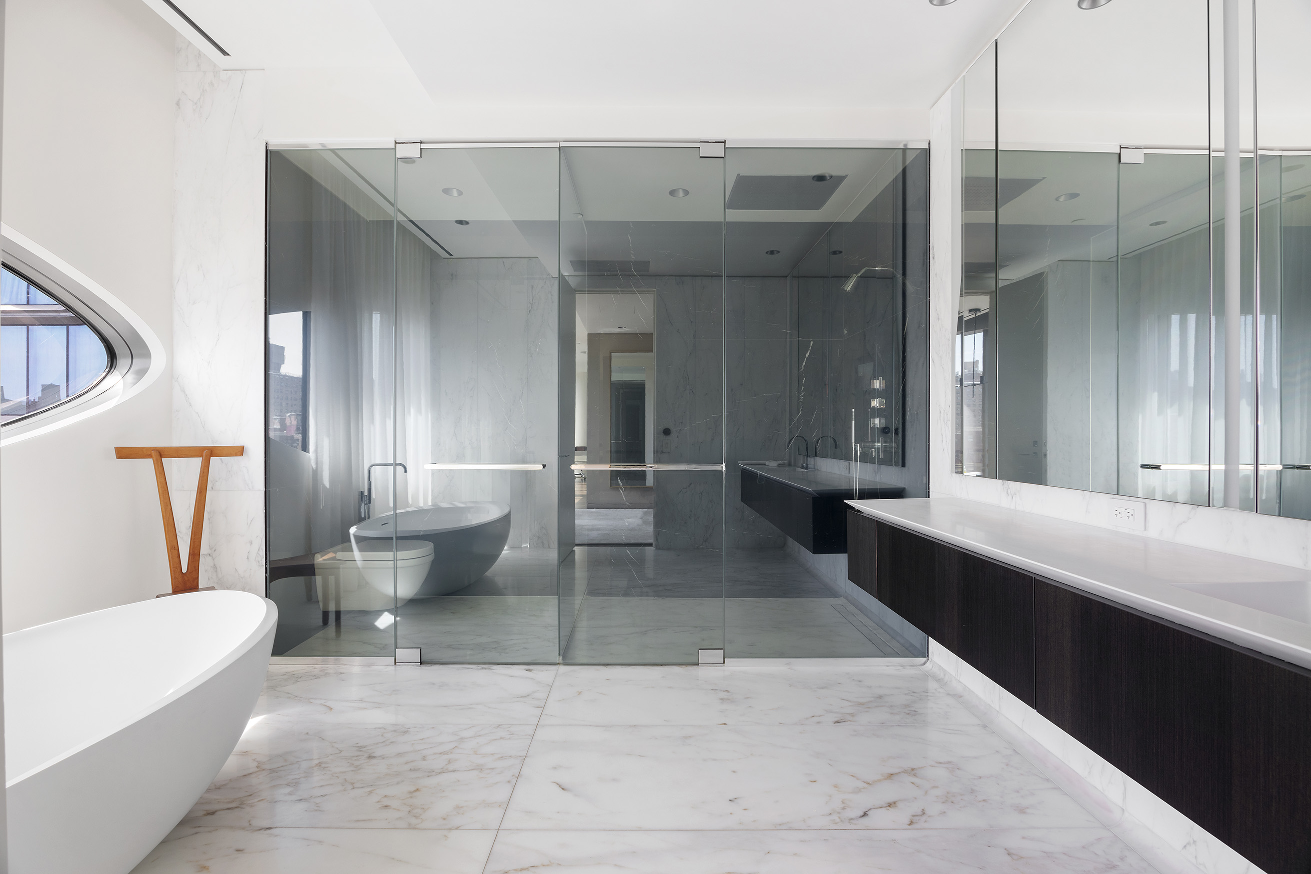 520 West 28th Street, Unit PH37 Manhattan, NY 10001 - Photo 35 of 45 a spacious bathroom with a bathtub and shower