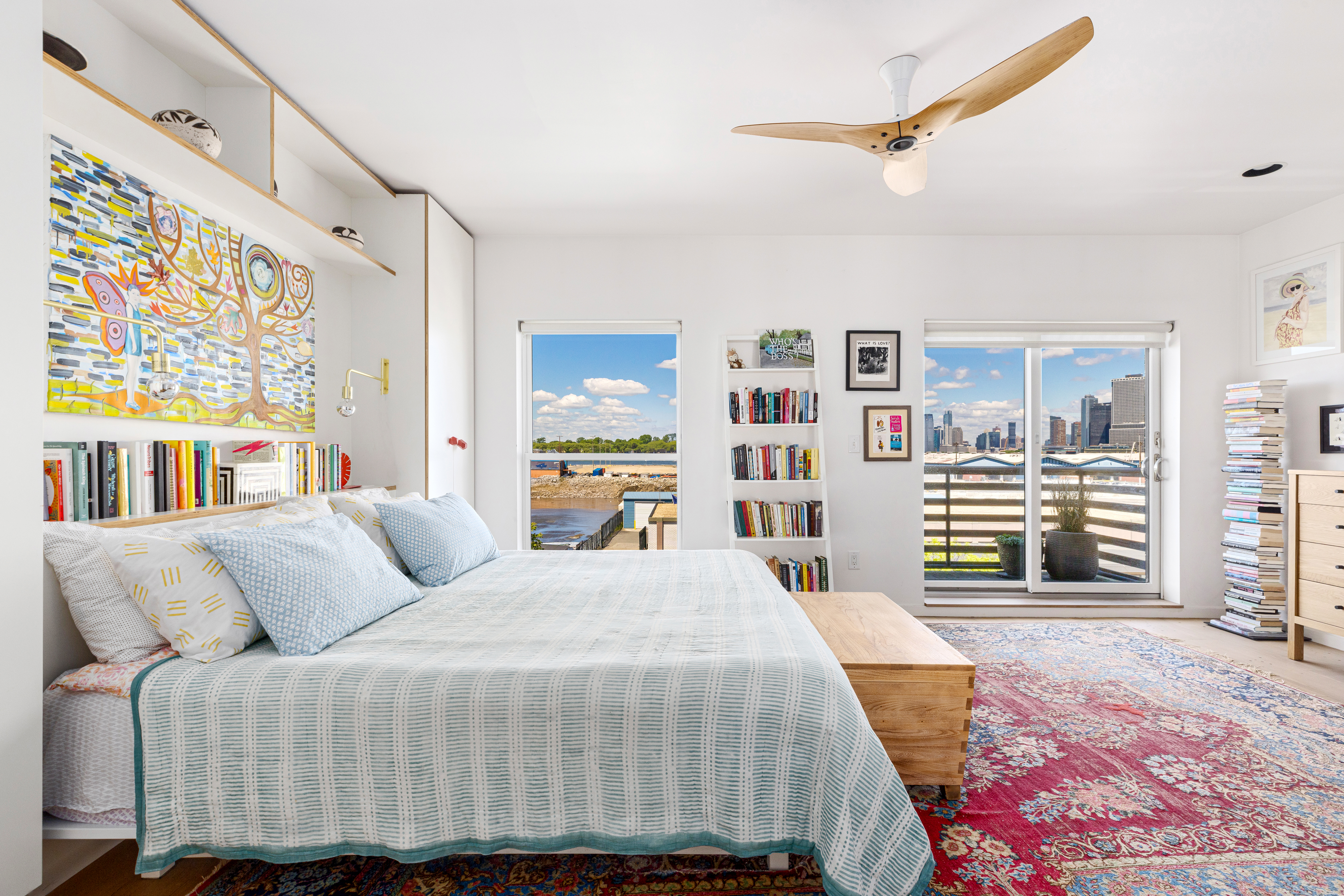 113 A Columbia Street Brooklyn, NY 11201 - Photo 10 of 21 a bedroom with a large bed and a large window
