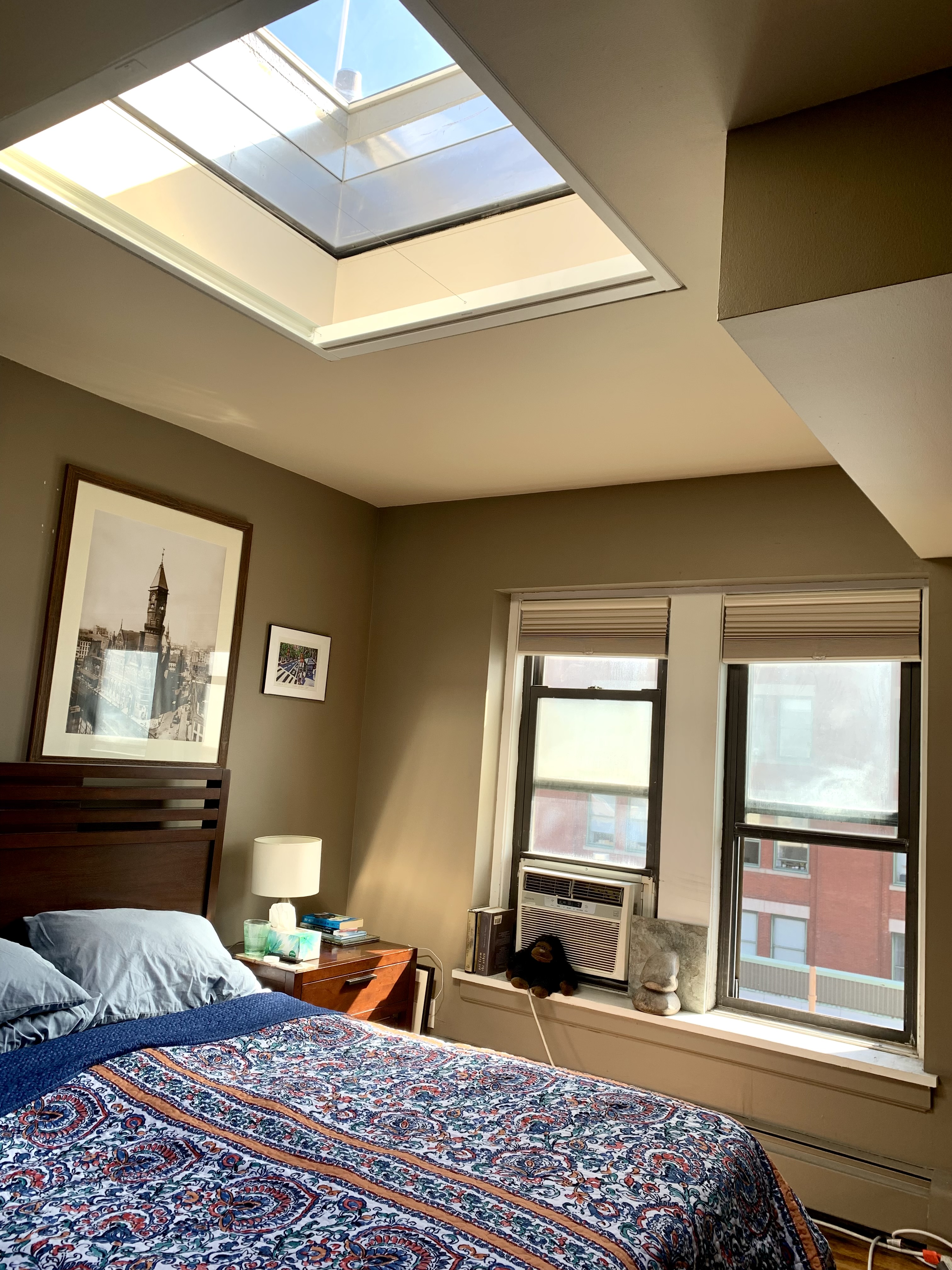130 Barrow Street, Unit PH508 Manhattan, NY 10014 - Photo 7 of 14 a bedroom with a bed and wooden floor