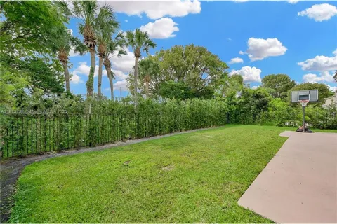 a view of a garden with a slide
