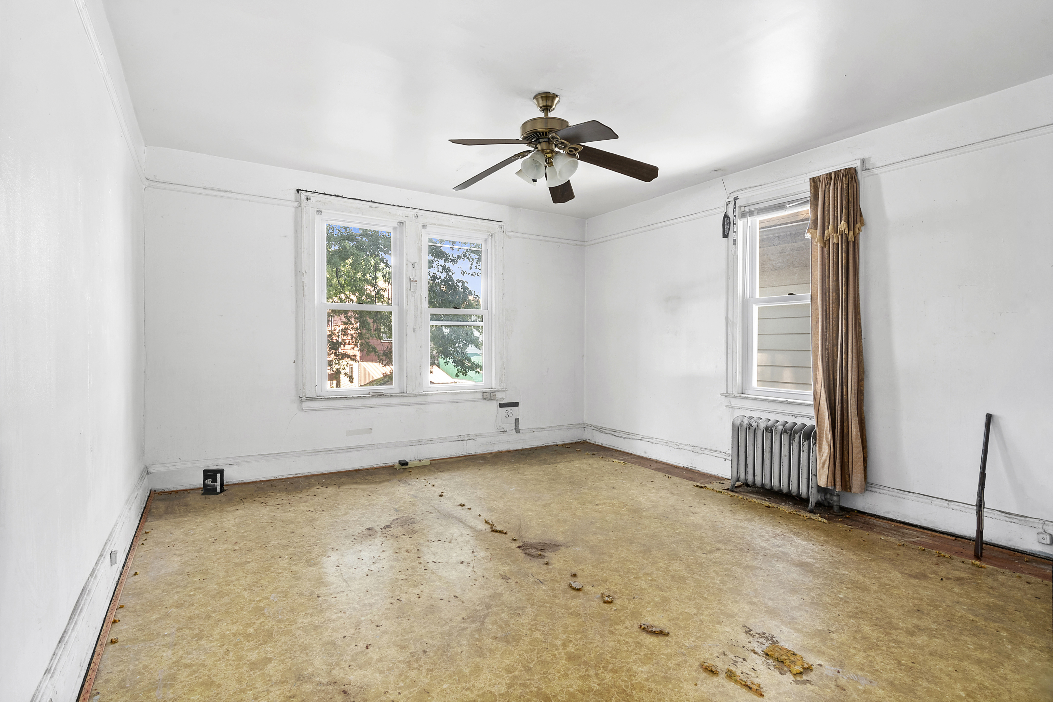 266 East 43rd Street Brooklyn, NY 11203 - Photo 7 of 11 a view of an empty room with a window