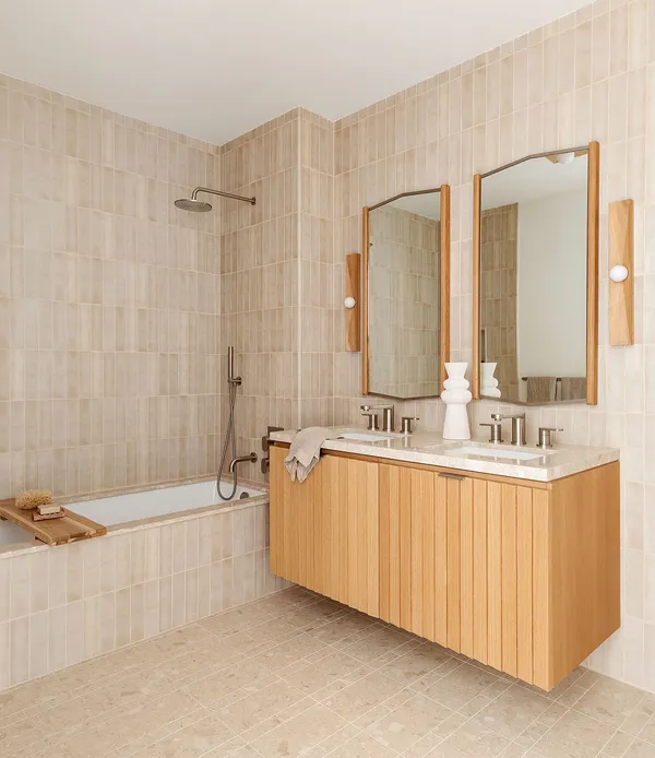 a bathroom with a bathtub and a sink