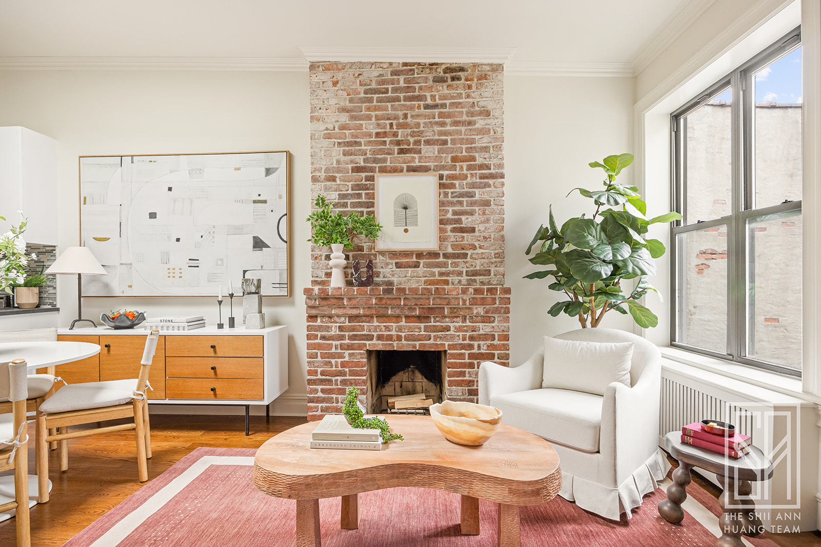 307 7th Street, Unit 4L Brooklyn, NY 11215 - Photo 7 of 15 a living room with furniture a fireplace and a floor to ceiling window