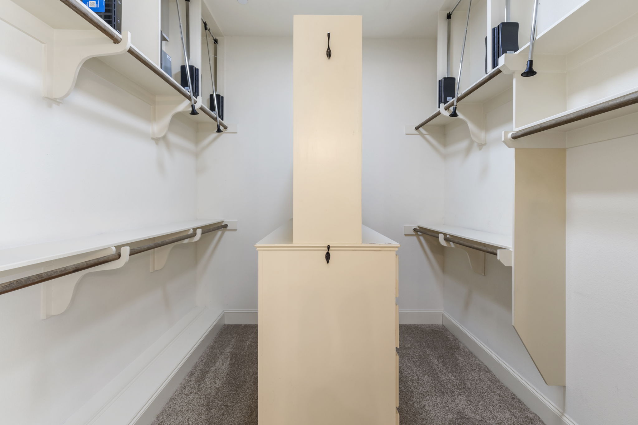 5407 Feagan Street Houston, TX 77007 - Photo 24 of 43 a view of walk in closet with empty racks