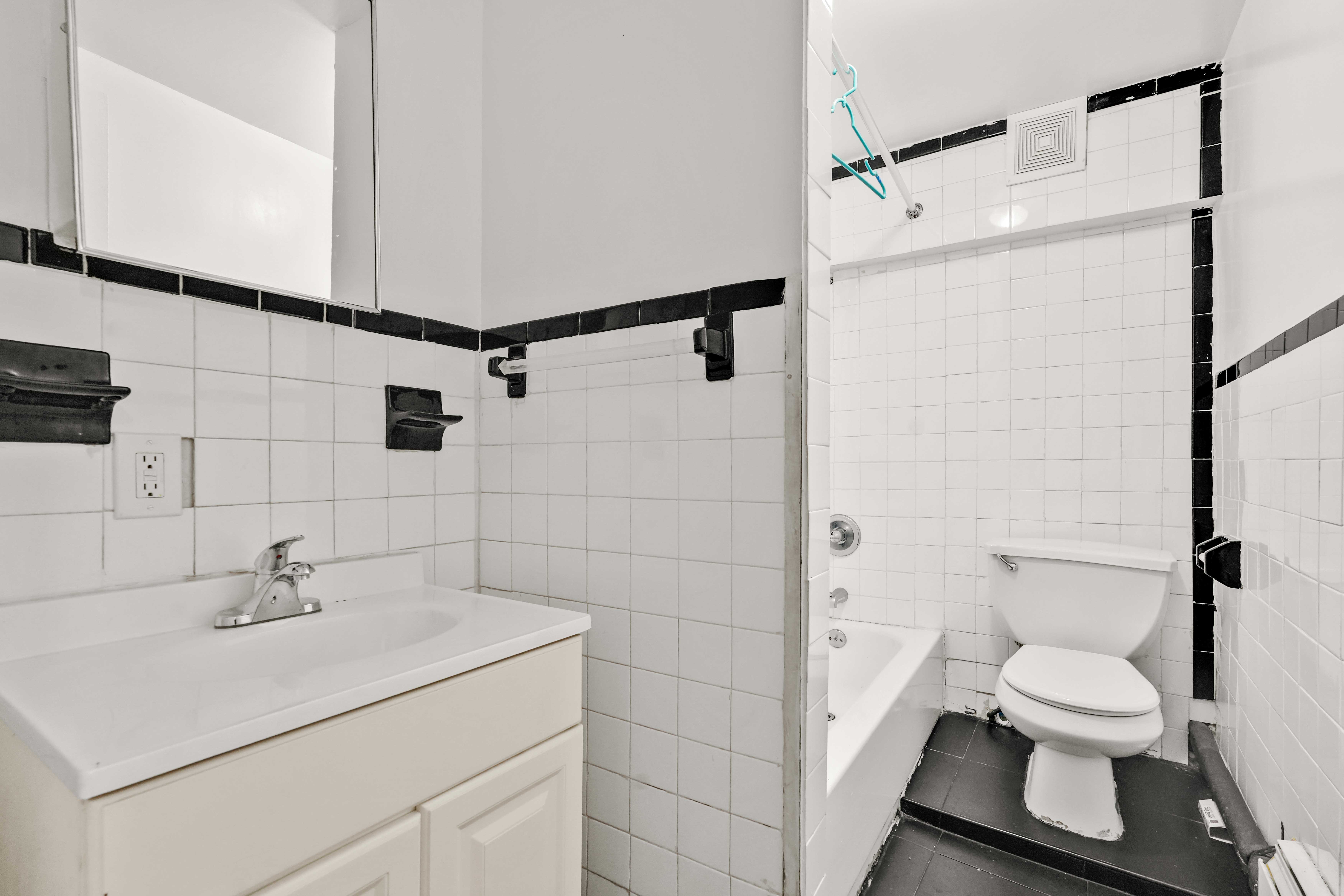 278 Lefferts Avenue Brooklyn, NY 11225 - Photo 48 of 56 a bathroom with a sink toilet and shower