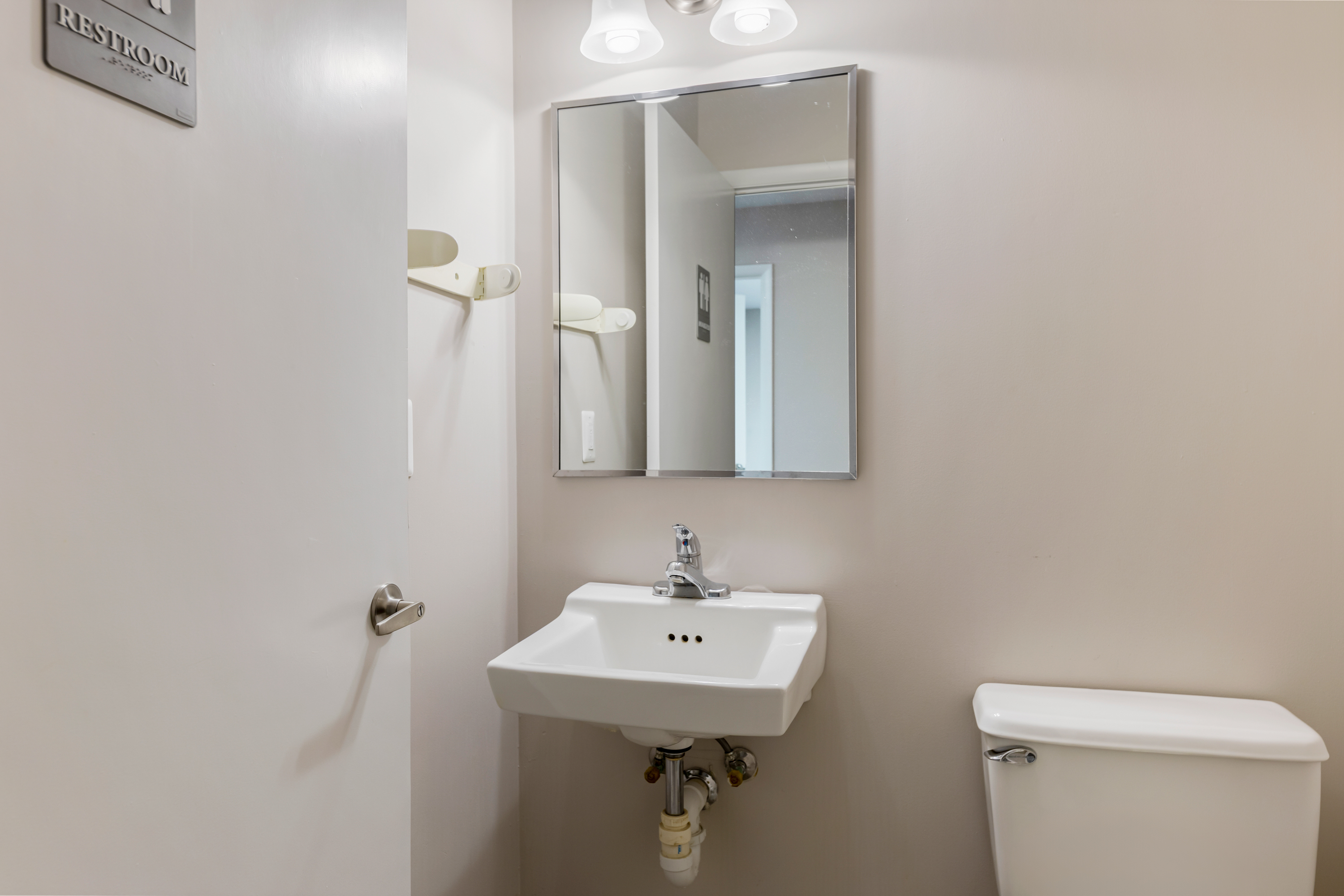 5885 Allentown Road Suitland, MD 20746 - Photo 13 of 23 a bathroom with a sink a toilet and mirror
