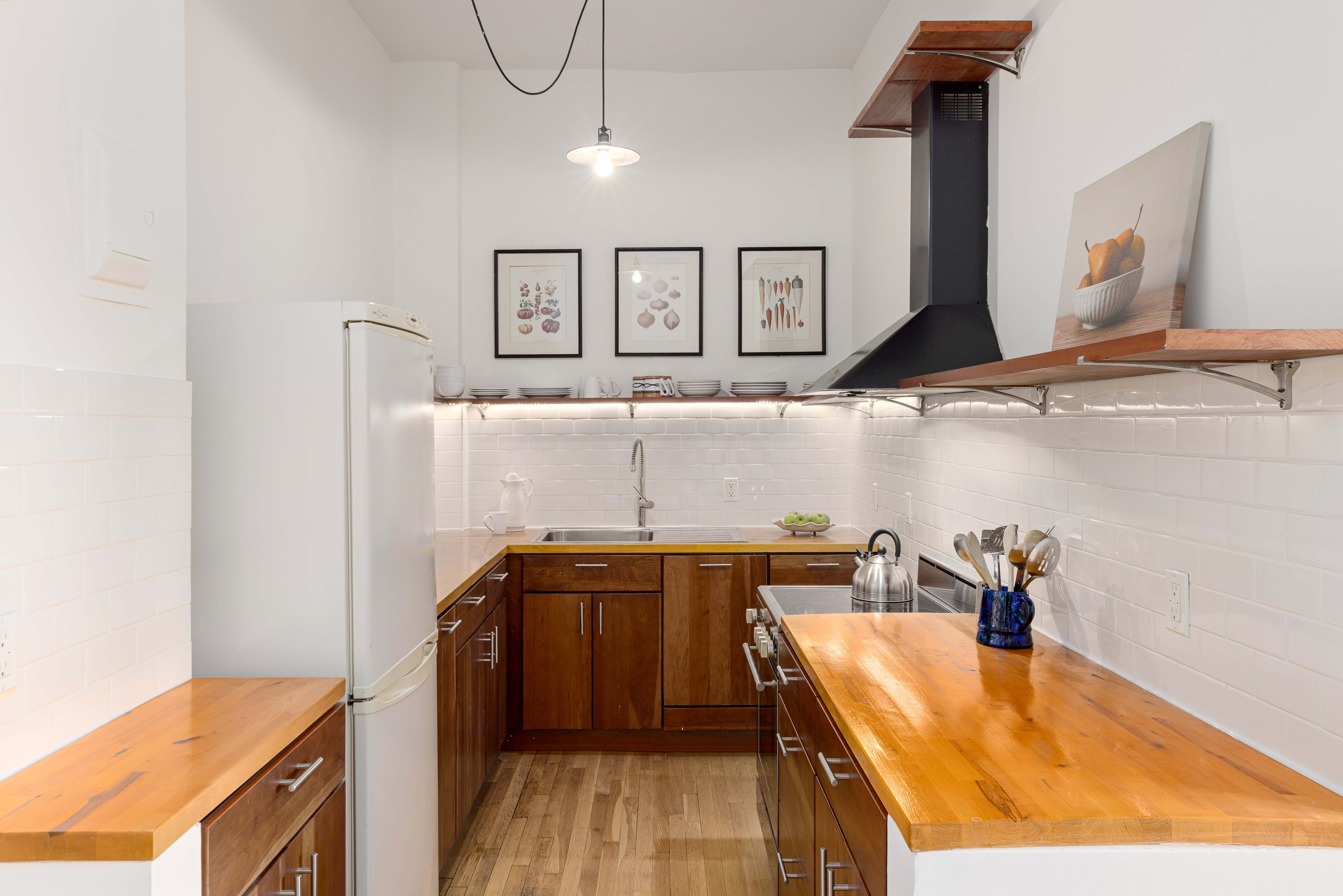 140 West 69th Street, Unit 56A Manhattan, NY 10023 - Photo 4 of 9 a room with storage and utility