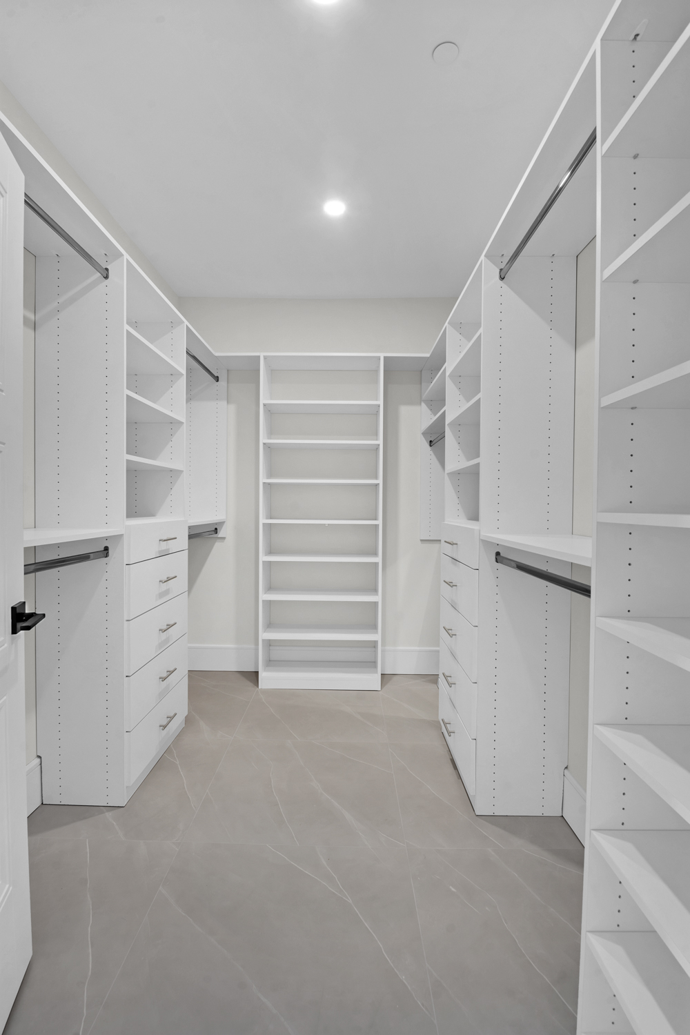 5 Osprey Court Staten Island, NY 10308 - Photo 23 of 50 a view of walk in closet with white cabinet