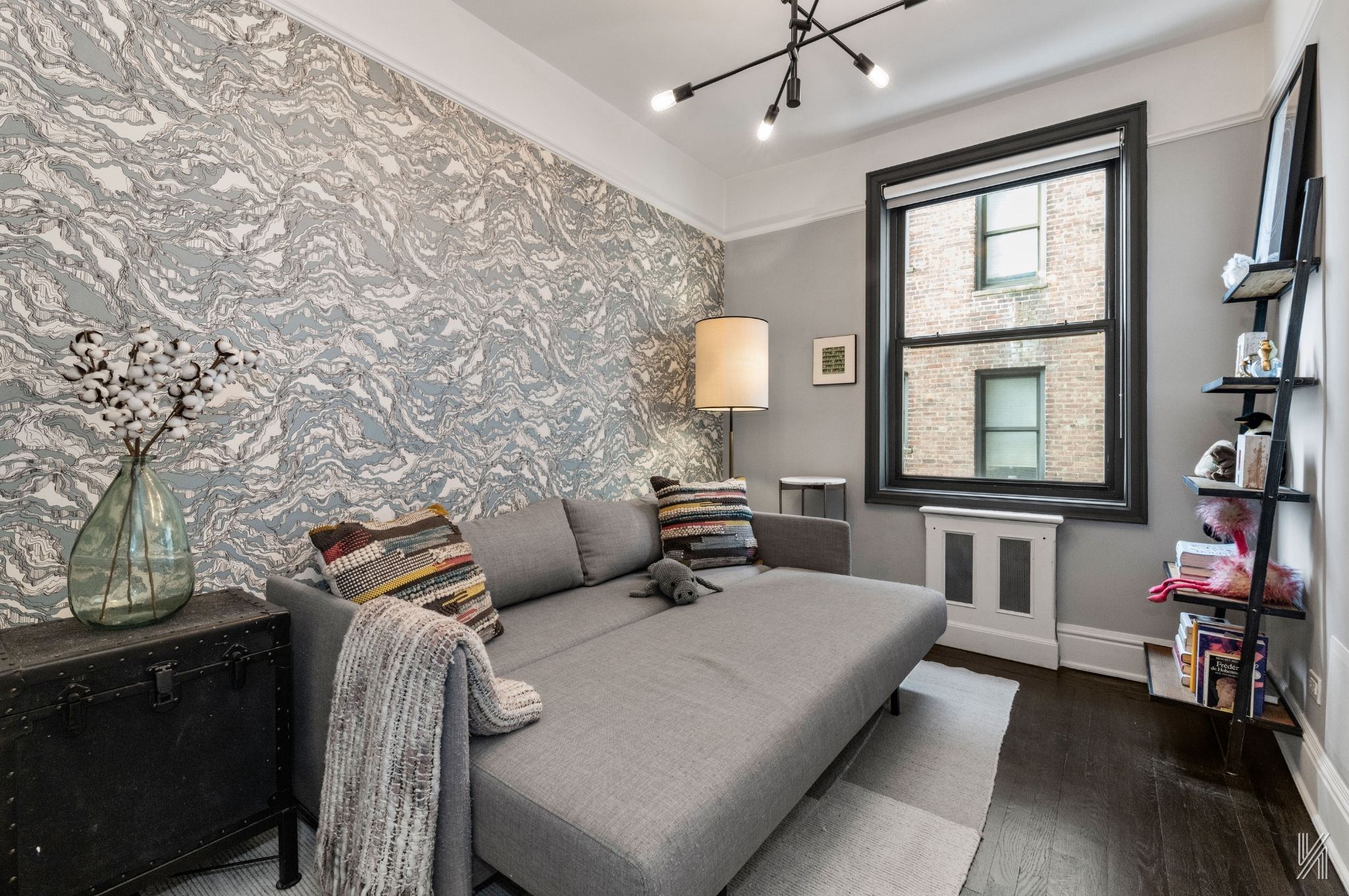 35-06 88th Street, Unit 3G Queens, NY 11372 - Photo 14 of 20 a bedroom with furniture and a window