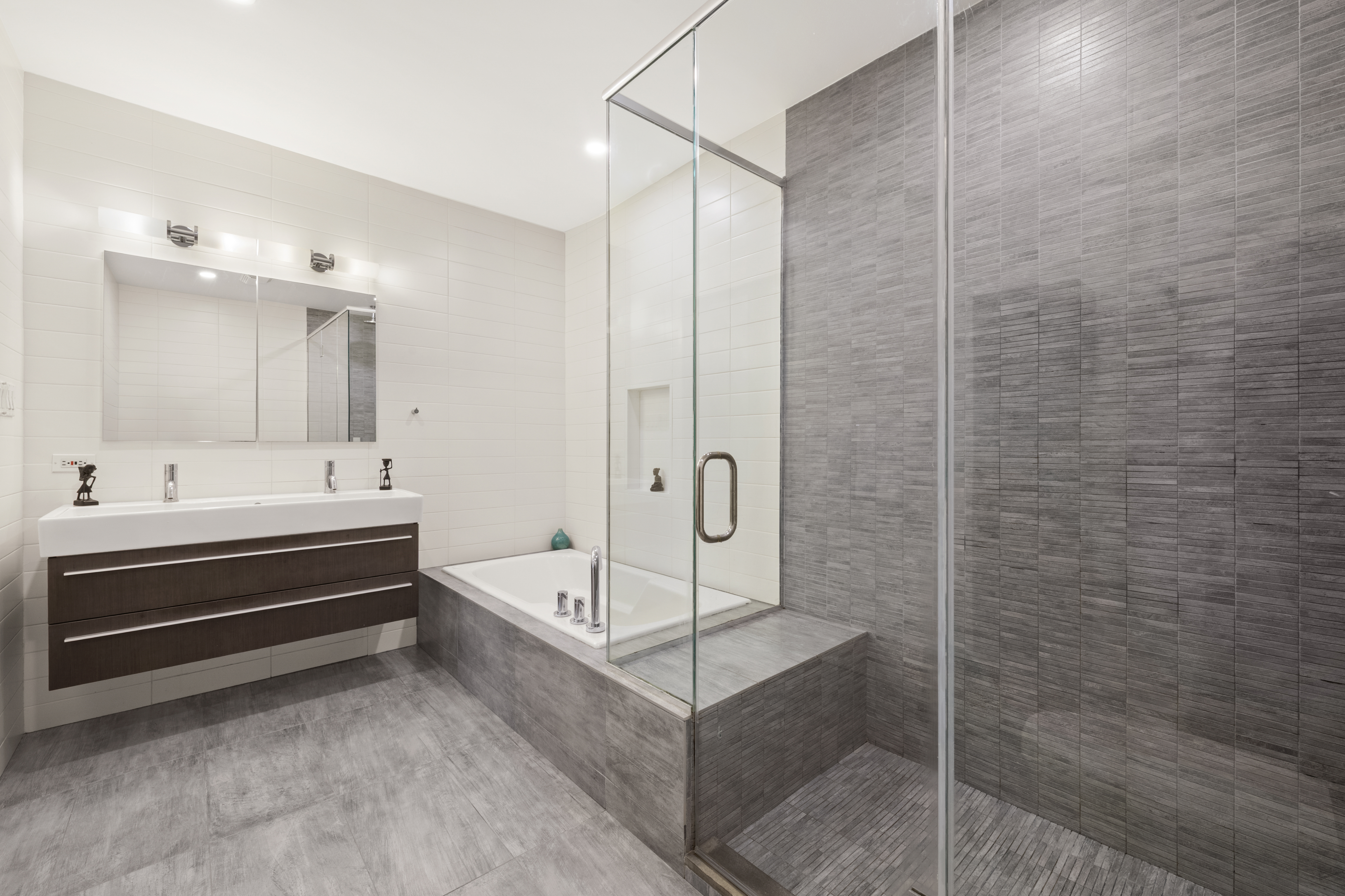 110 Duane Street, Unit 3F Manhattan, NY 10007 - Photo 7 of 14 a bathroom with a bathtub a shower and a sink