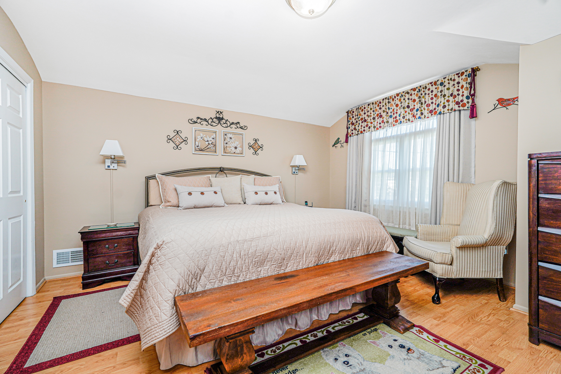 287 Greaves Avenue Staten Island, NY 10308 - Photo 15 of 35 a large bed sitting in a bedroom next to a window