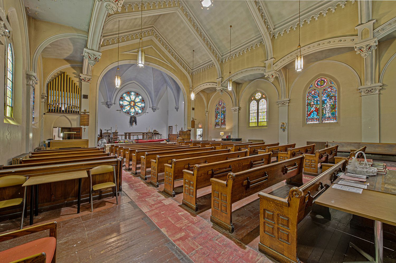 a view of a hall with many windows