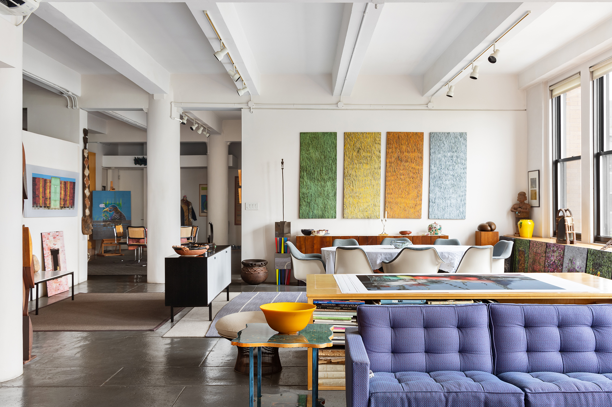 477 Washington Street Manhattan, NY 10013 - Photo 5 of 20 a living room with lots of furniture and a table