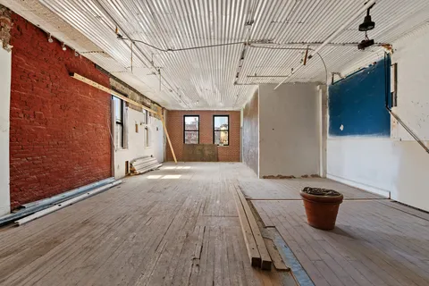 a view of a house with a wooden floor