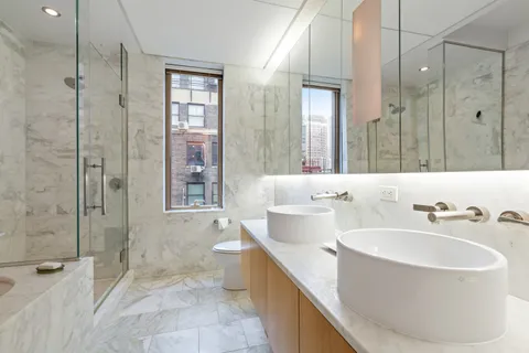 a bathroom with a bathtub and a sink