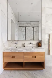 a black and white photo of a bench