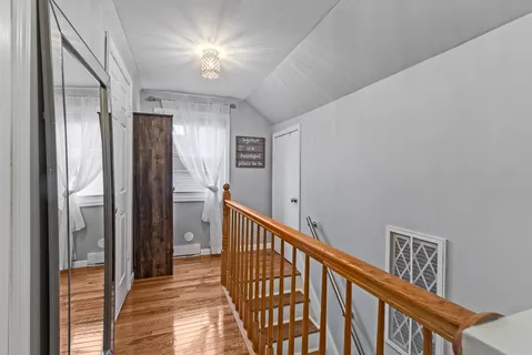 a view of hallway with stairs