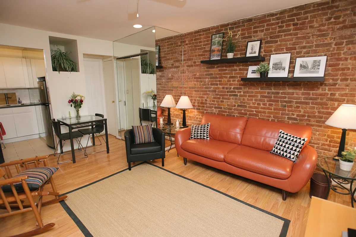 161 West 71st Street, Unit 1A Manhattan, NY 10023 - Photo 2 of 7 a living room with furniture