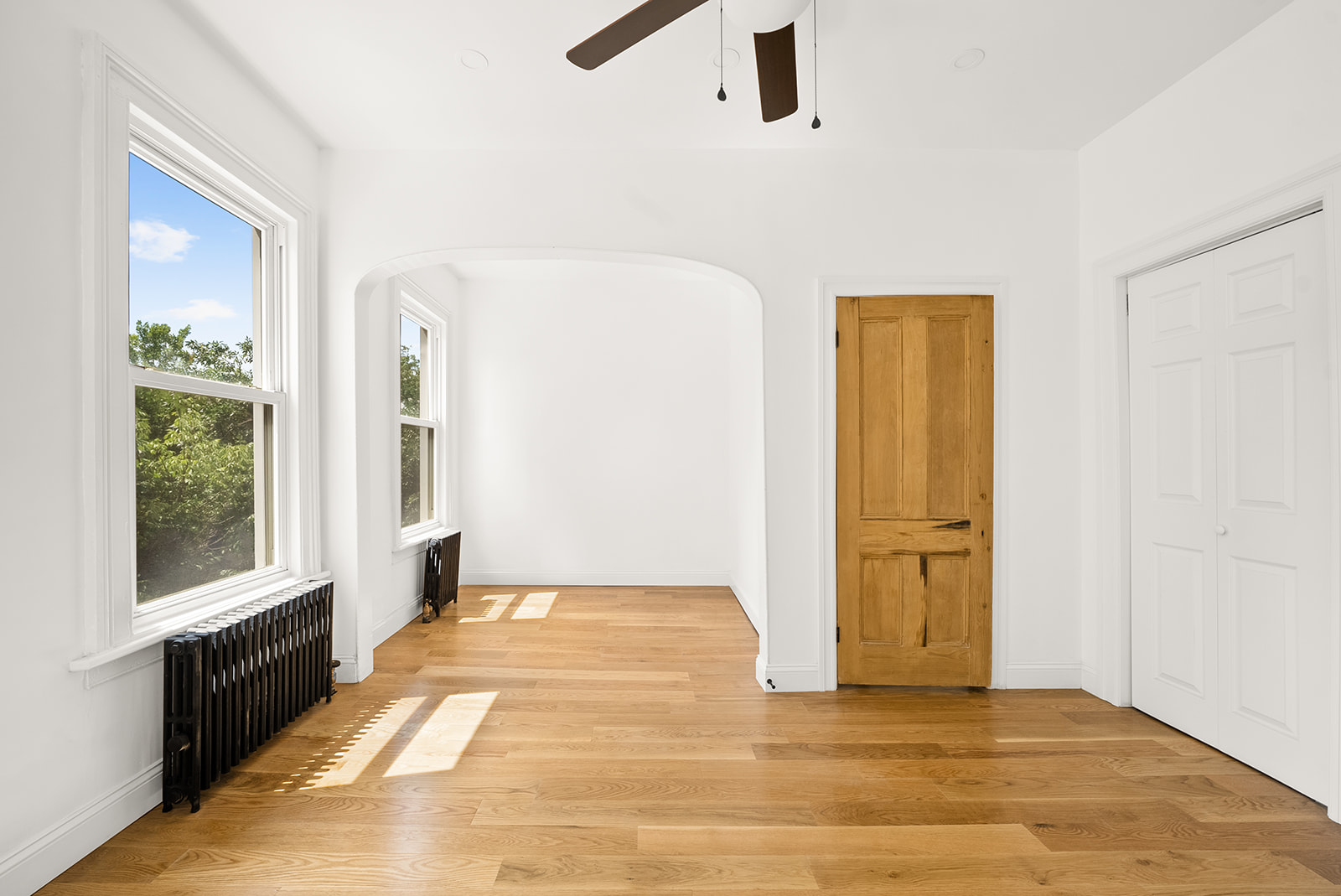 211 12th Street, Unit 2 Brooklyn, NY 11215 - Photo 4 of 7 a view of an empty room with glass door