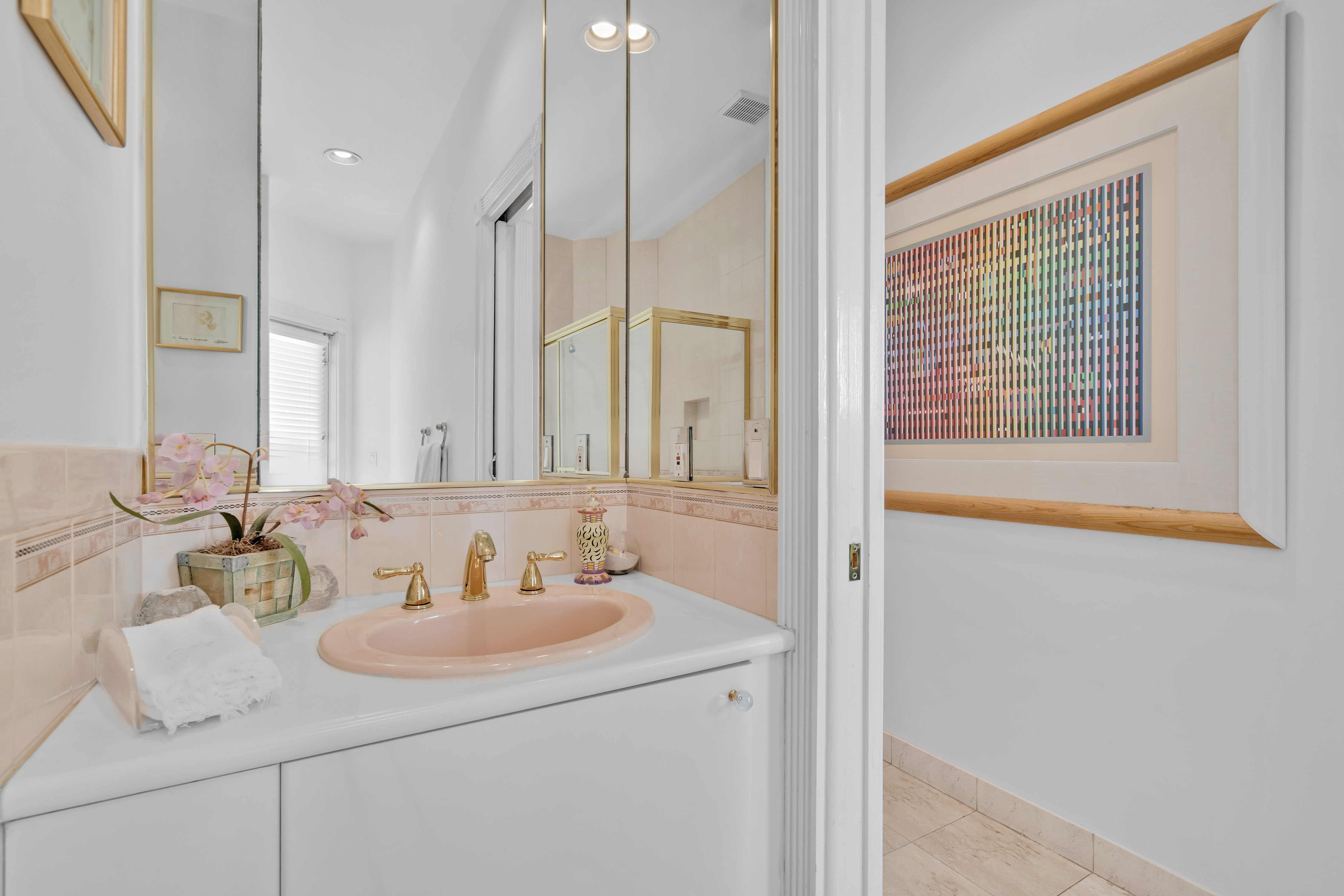 8768 Southwest 62nd Court Miami, FL 33156 - Photo 29 of 56 a bathroom with a sink and a mirror