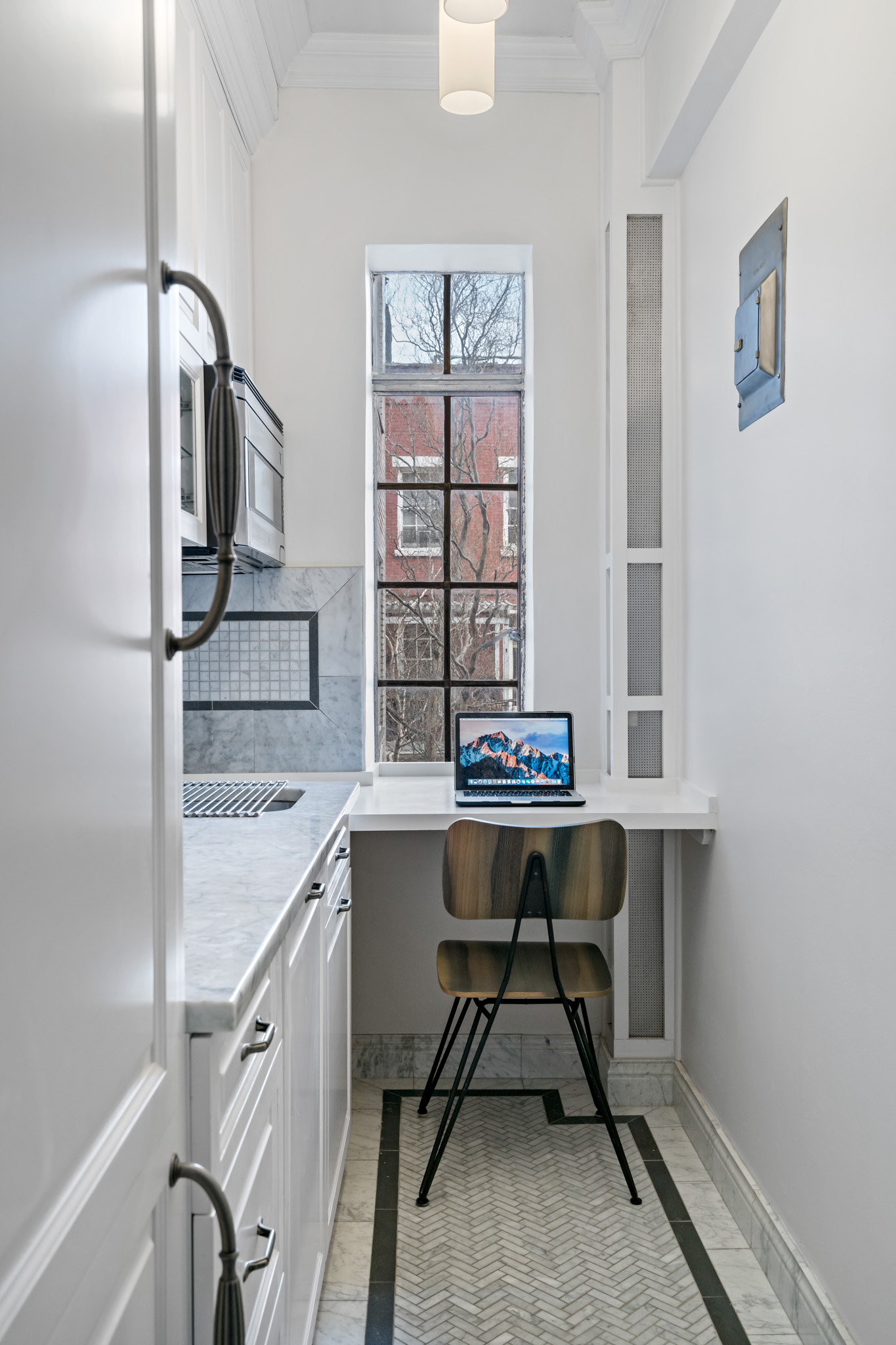 299 West 12th Street, Unit 3JH Manhattan, NY 10014 - Photo 10 of 15 a view of workspace with window