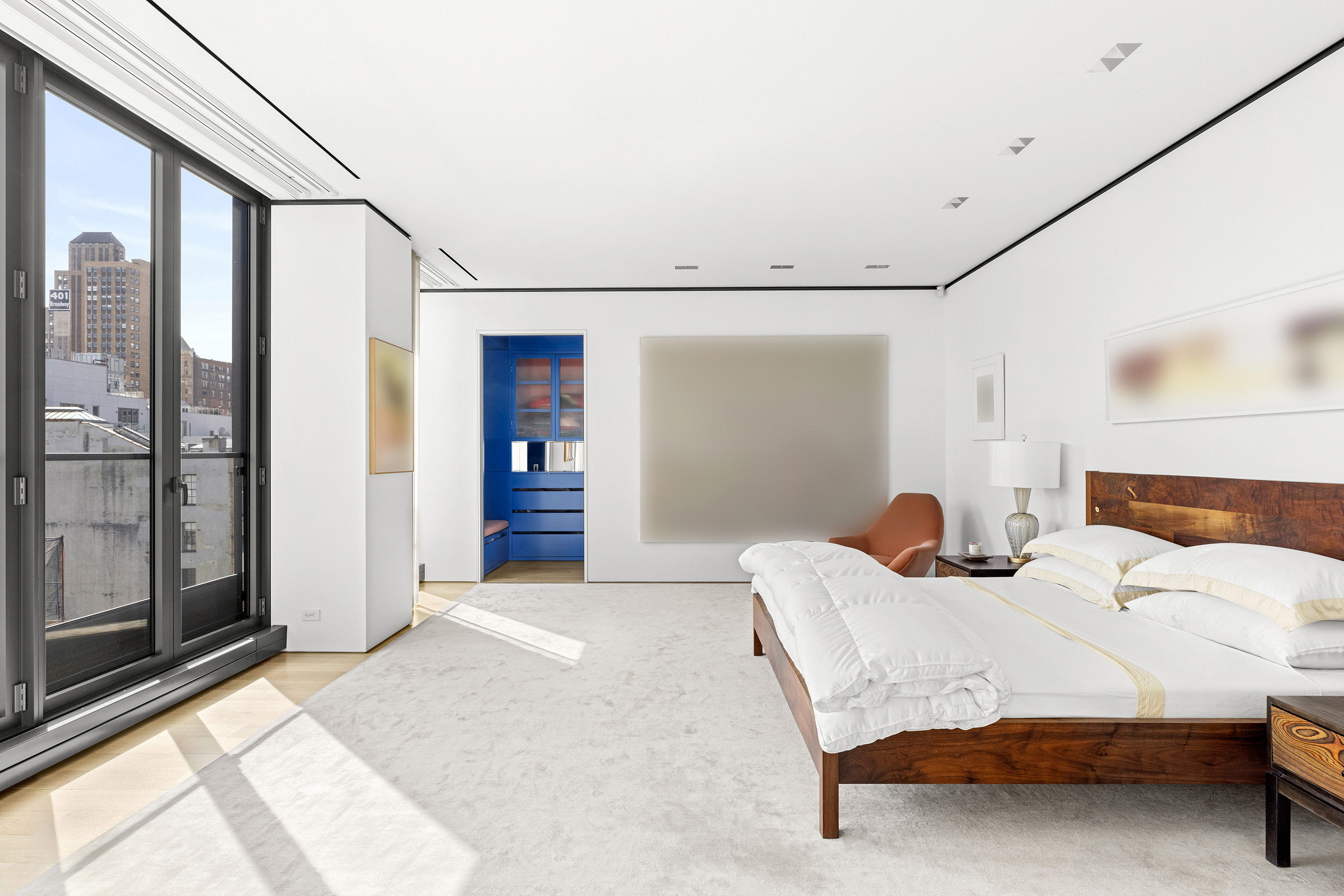 27 Wooster Street, Unit PH Manhattan, NY 10013 - Photo 20 of 34 a bedroom with a bed and a mirror