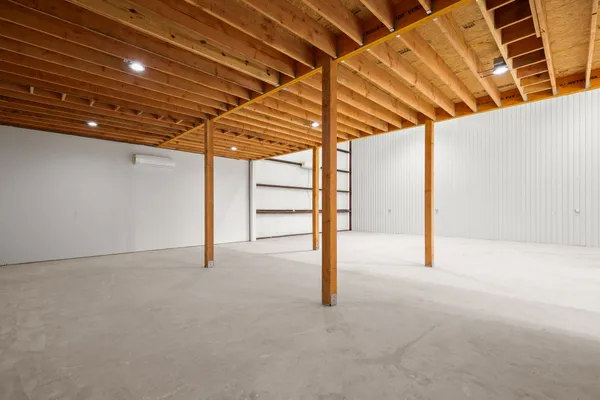 a view of a room with wooden walls