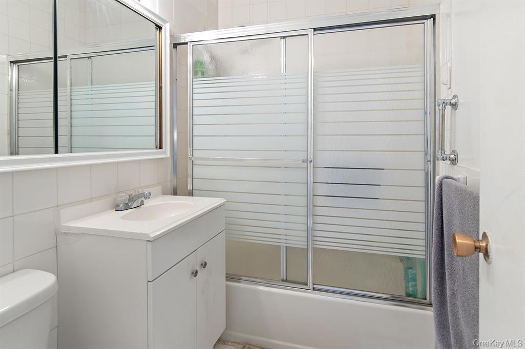 2400 Johnson Avenue, Unit 3B Bronx, NY 10463 - Photo 17 of 28 a bathroom with a sink and a toilet