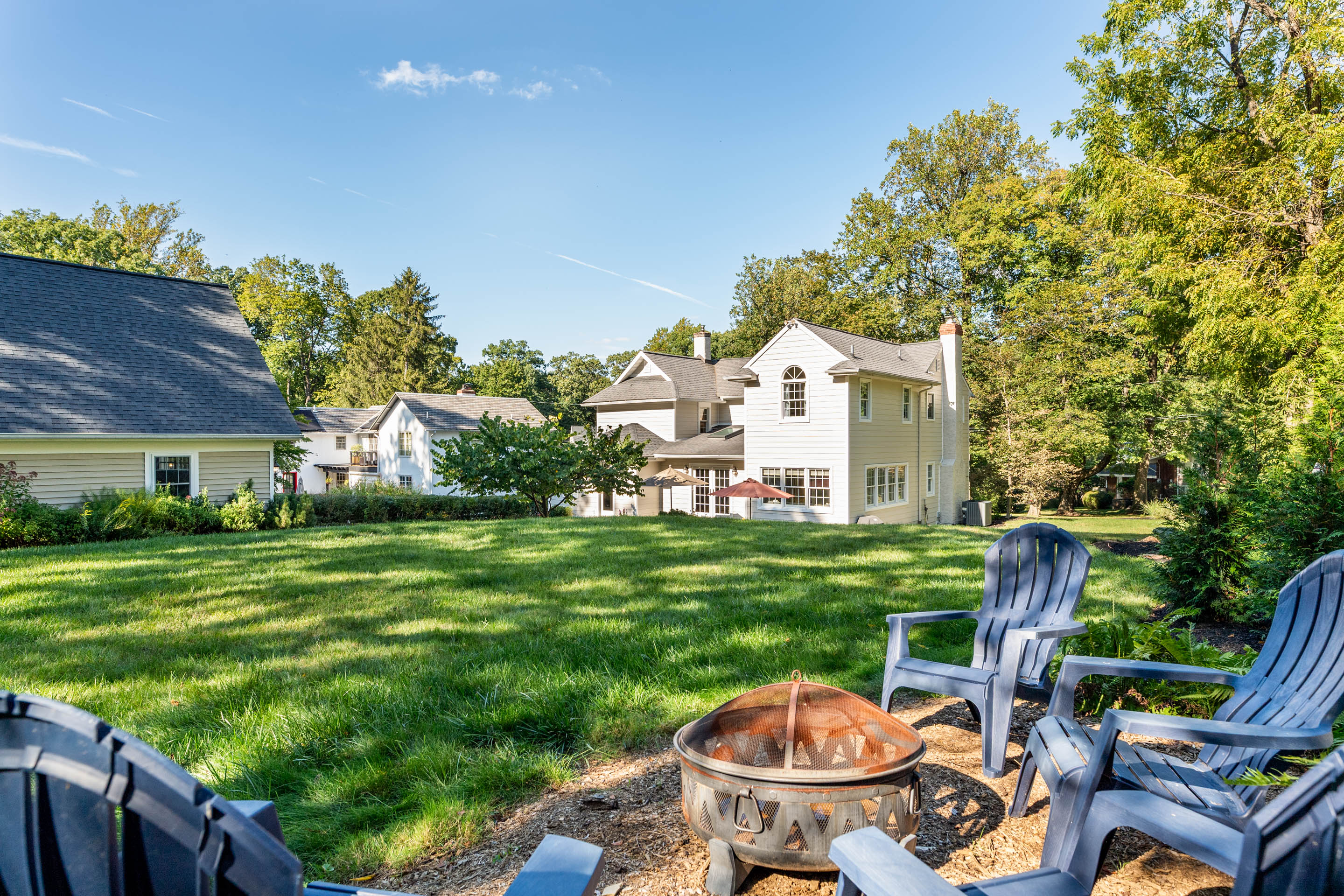 1136 Seaton Ross Road Wayne, PA 19087 - Photo 44 of 48 a view of a house with backyard sitting area and garden