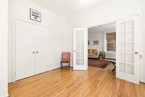a view of a livingroom with furniture and wooden floor