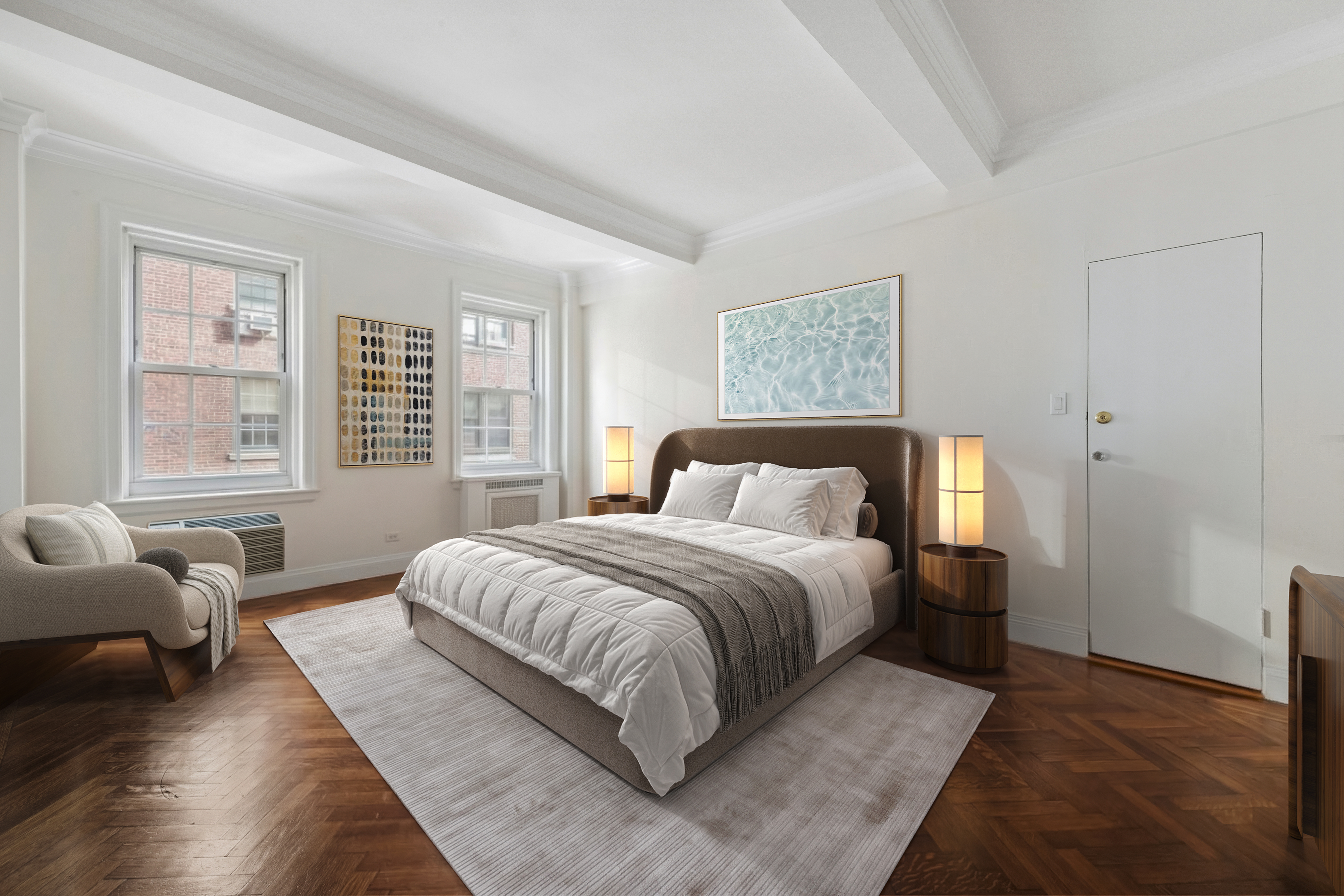 520 East 86th Street, Unit 9B Manhattan, NY 10028 - Photo 9 of 18 a bedroom with a large bed and a couch