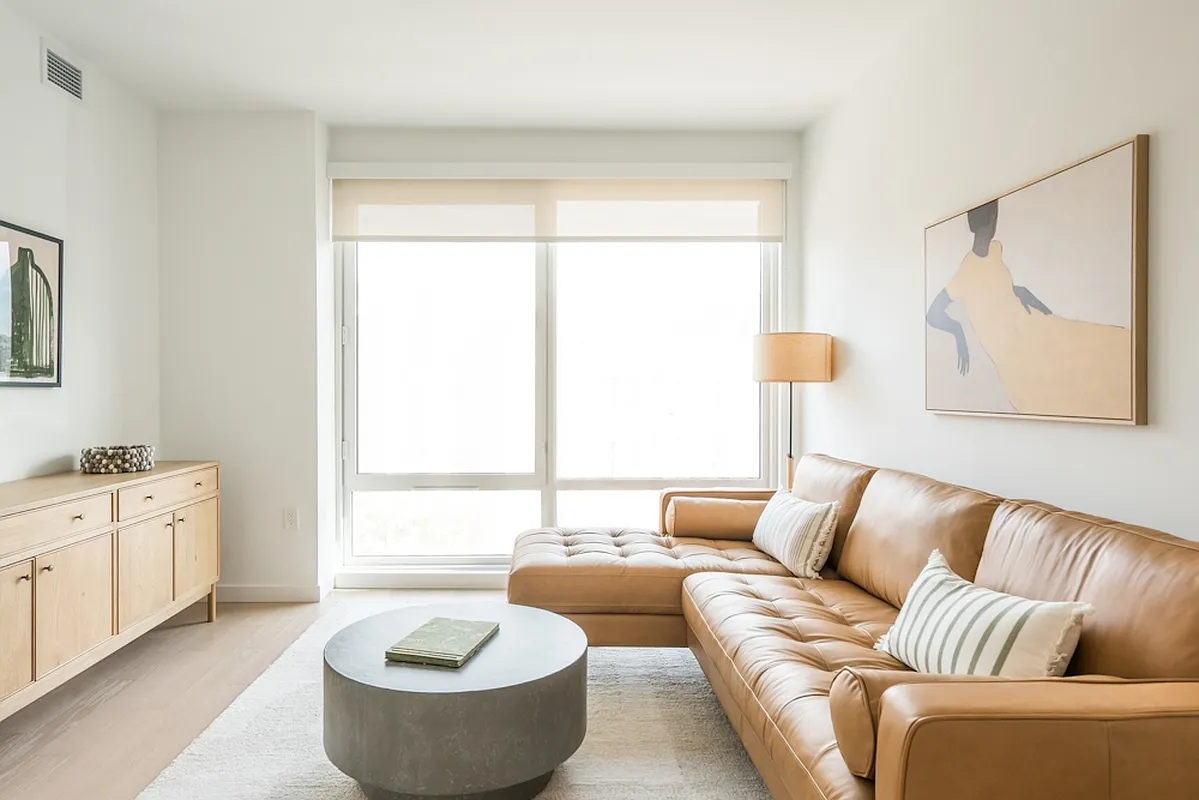 975 Nostrand Avenue, Unit 330 Brooklyn, NY 11225 - Photo 11 of 21 a living room with furniture and a large window