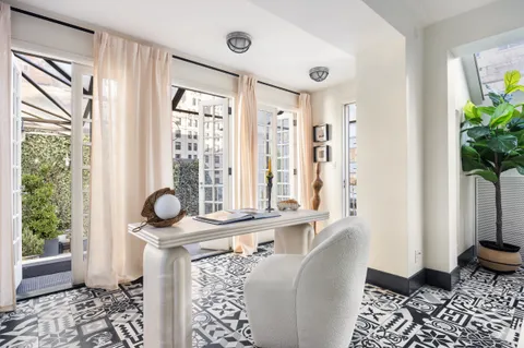 a room with furniture and window