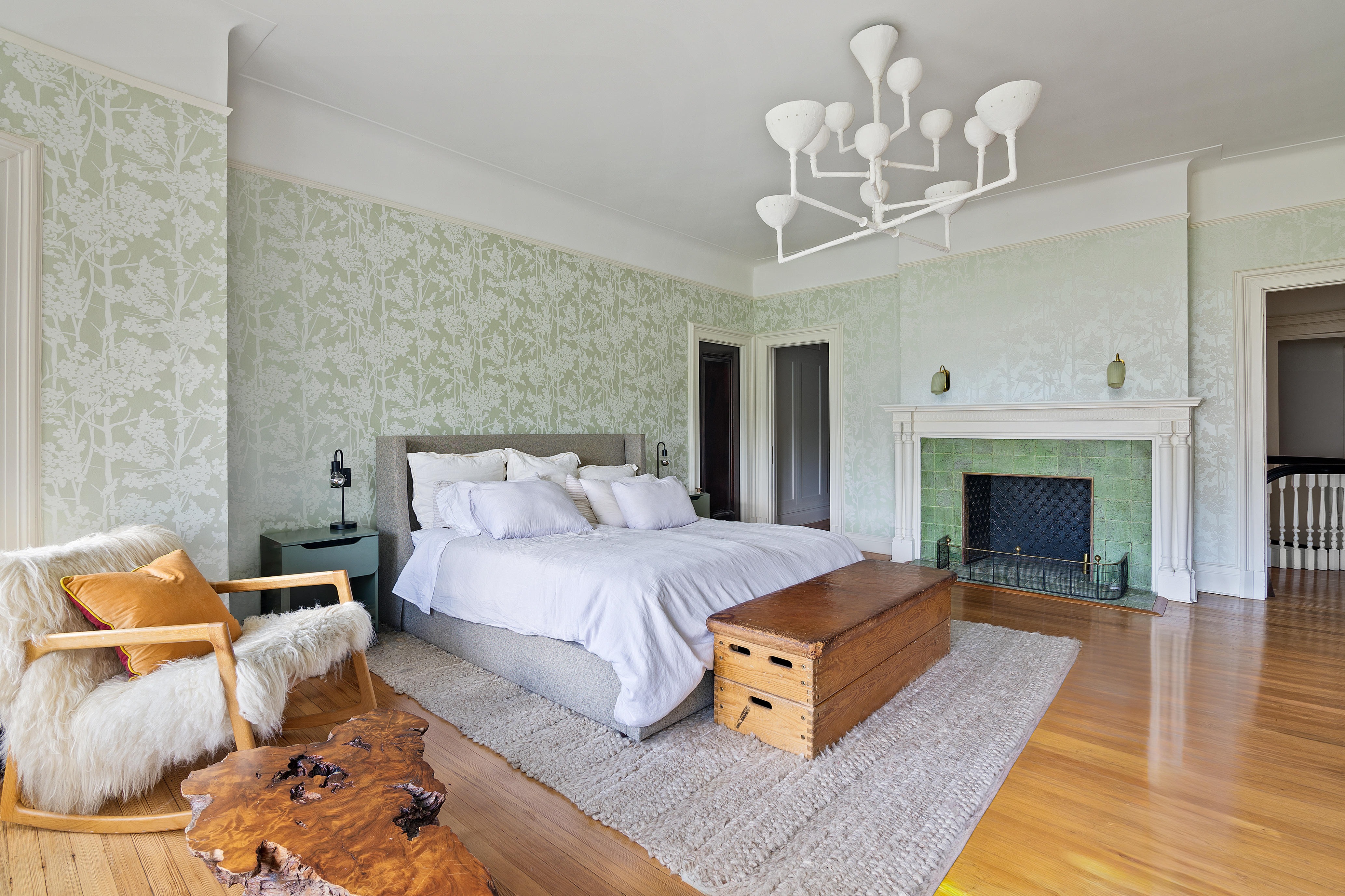 1440 Albemarle Road Brooklyn, NY 11226 - Photo 18 of 39 a spacious bedroom with a bed and a fireplace