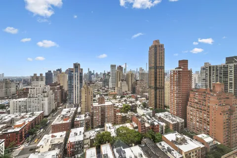 a city view with tall buildings