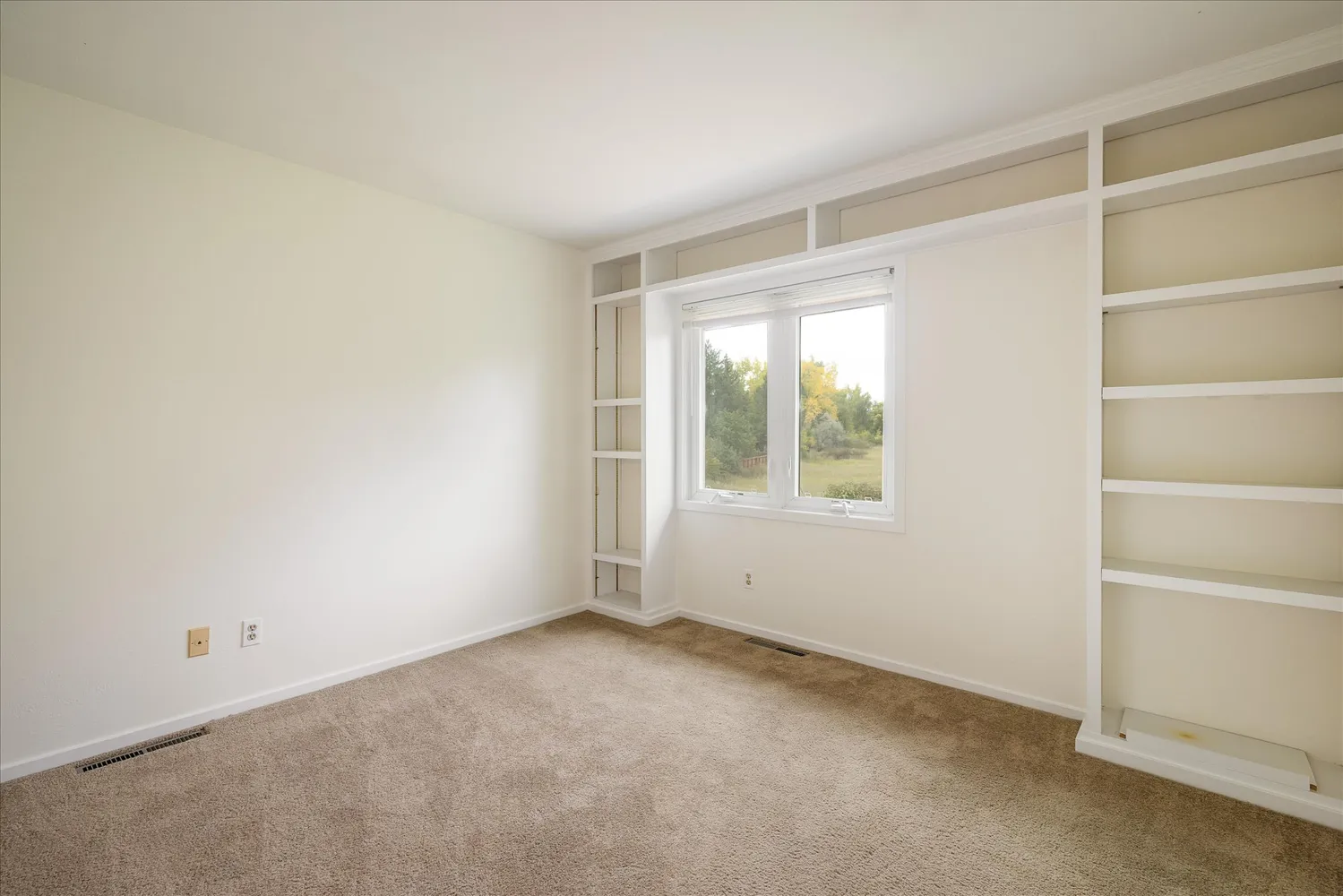 an empty room with a window