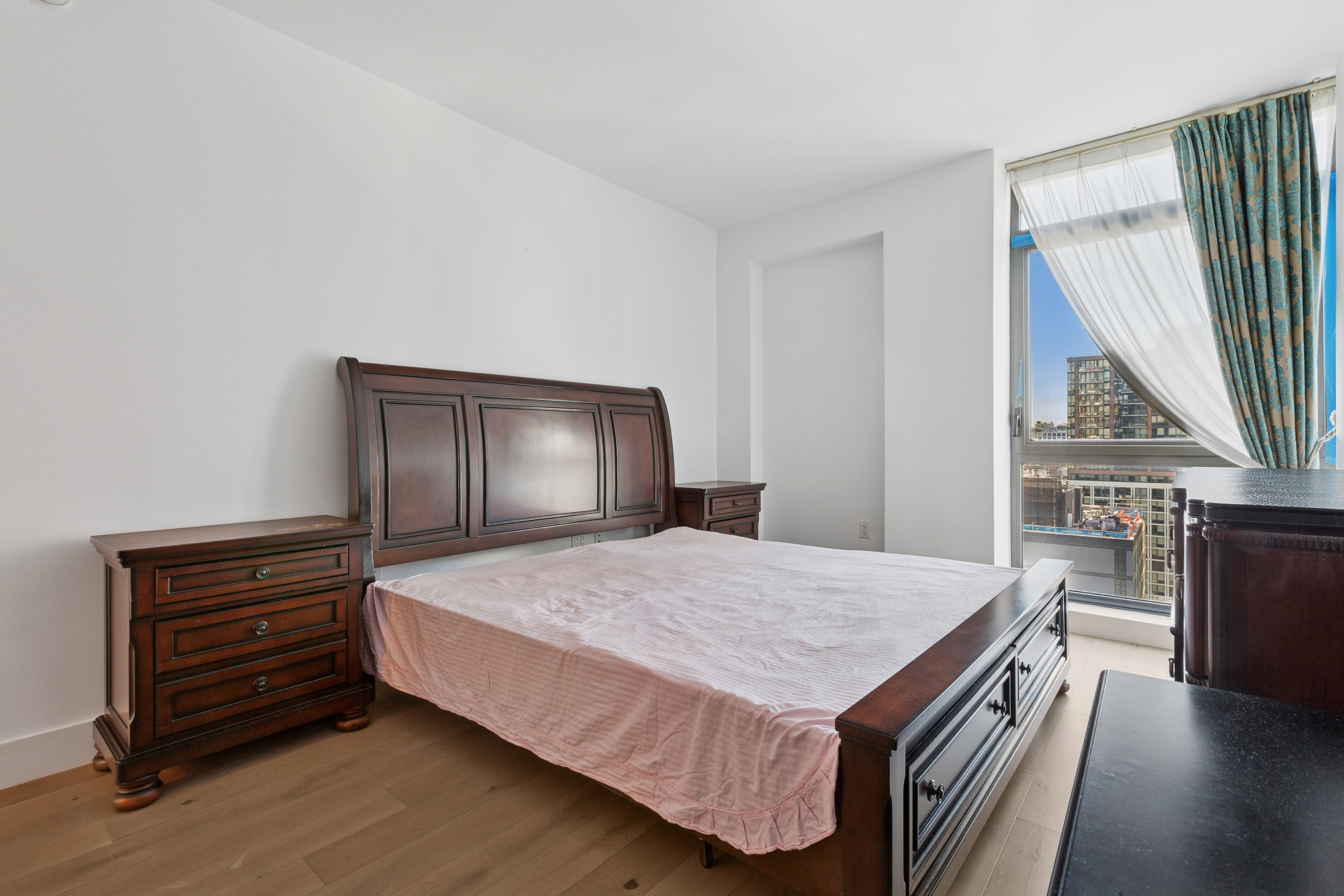 319 Schermerhorn Street, Unit 19B Brooklyn, NY 11217 - Photo 5 of 13 a bedroom with a bed and a dresser