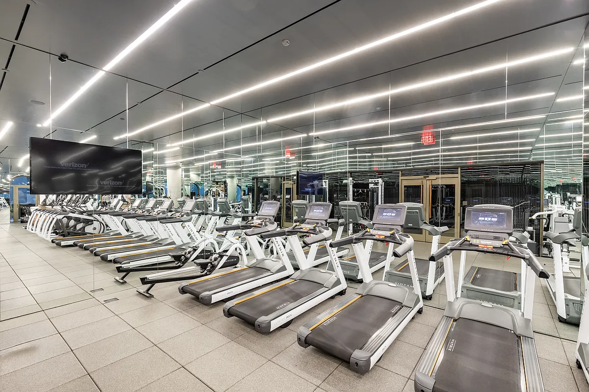 130 William Street, Unit 21A Manhattan, NY 10038 - Photo 10 of 13 a view of a room with gym equipment