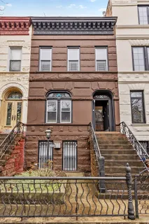 a picture of a bathroom with a shower