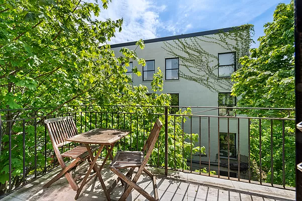 18 A Bleecker Street, Unit 4B Brooklyn, NY 11221 - Photo 2 of 11 a view of a chair and table in backyard of the house