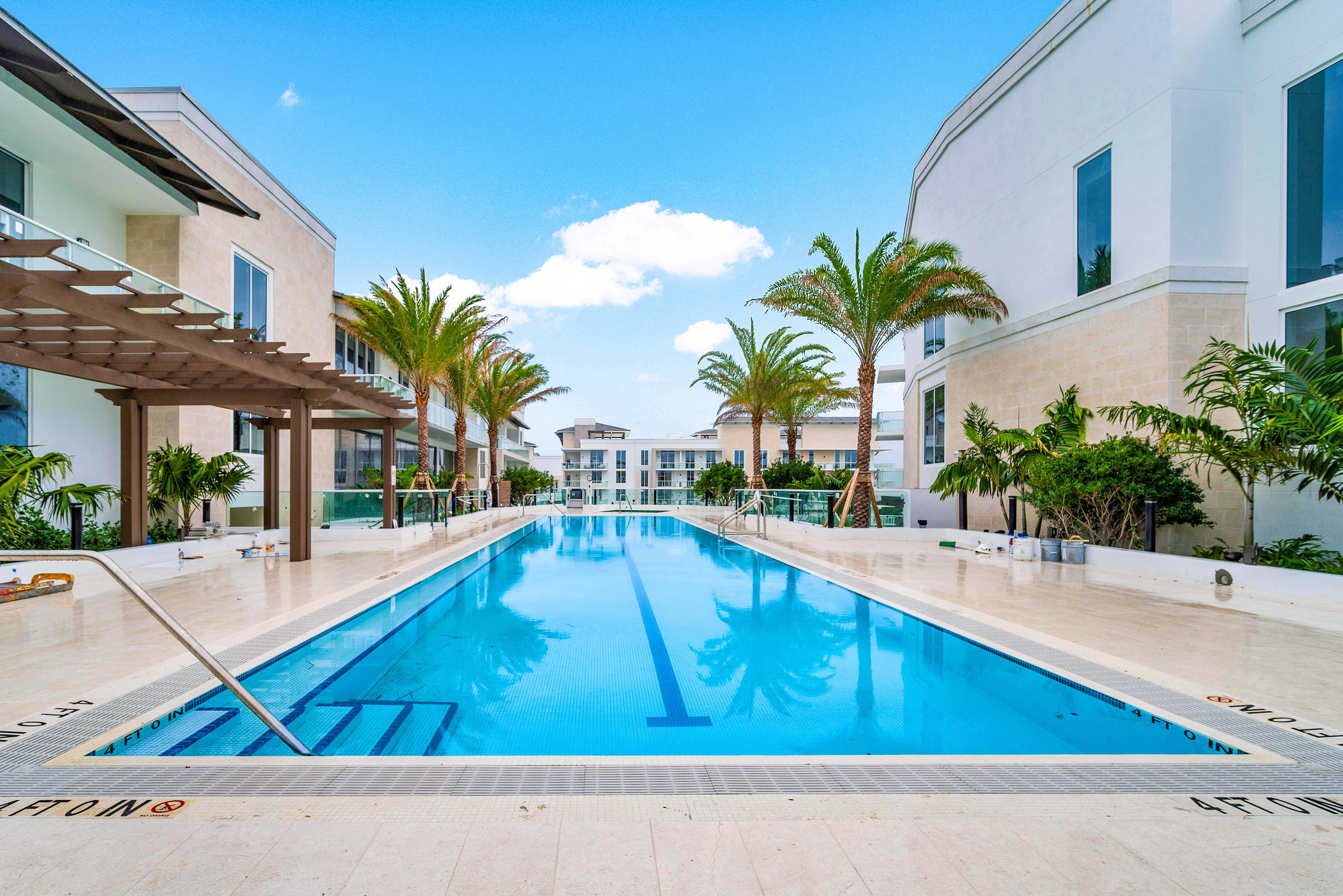 210 Southeast Mizner Boulevard, Unit 101 Boca Raton, FL 33432 - Photo 29 of 31 a view of swimming pool with outdoor seating