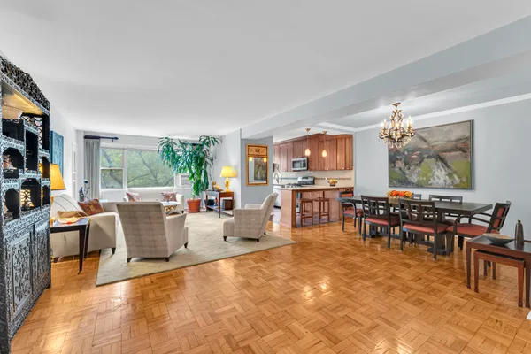 a living room with lots of furniture and window