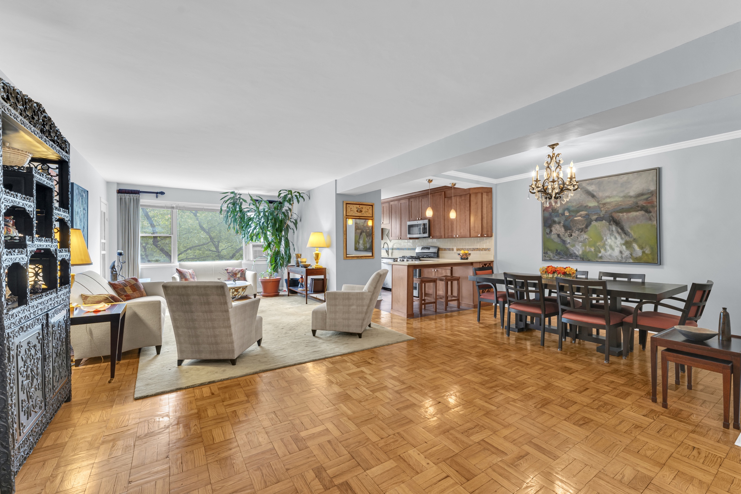 a living room with lots of furniture and window