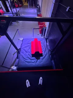 a bed room with a bed and a shower