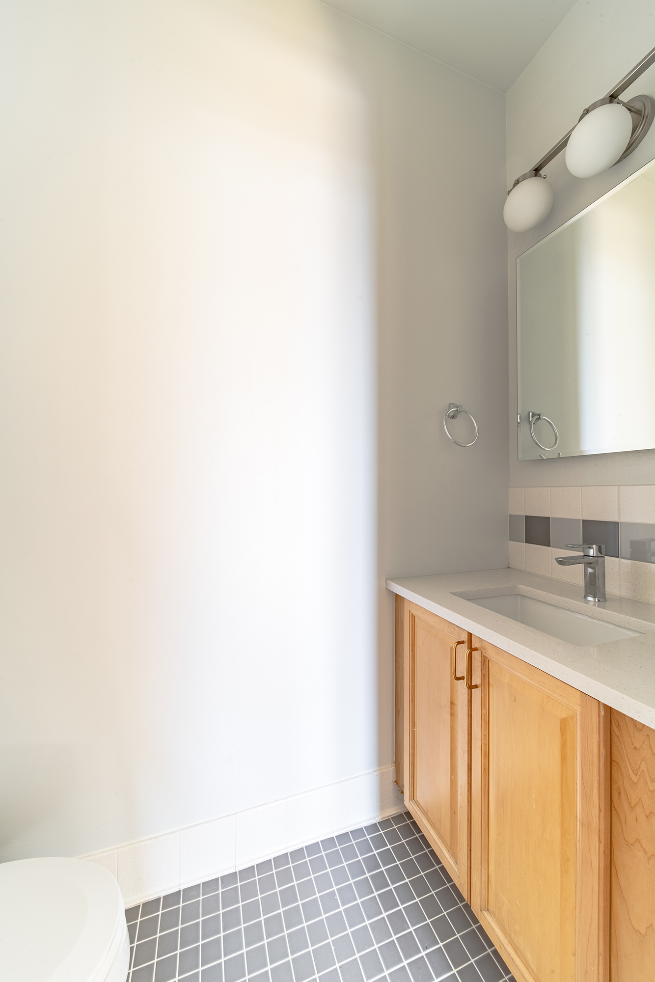 7 Mt Morris Park West, Unit D Manhattan, NY 10027 - Photo 4 of 16 a bathroom with a sink and a mirror