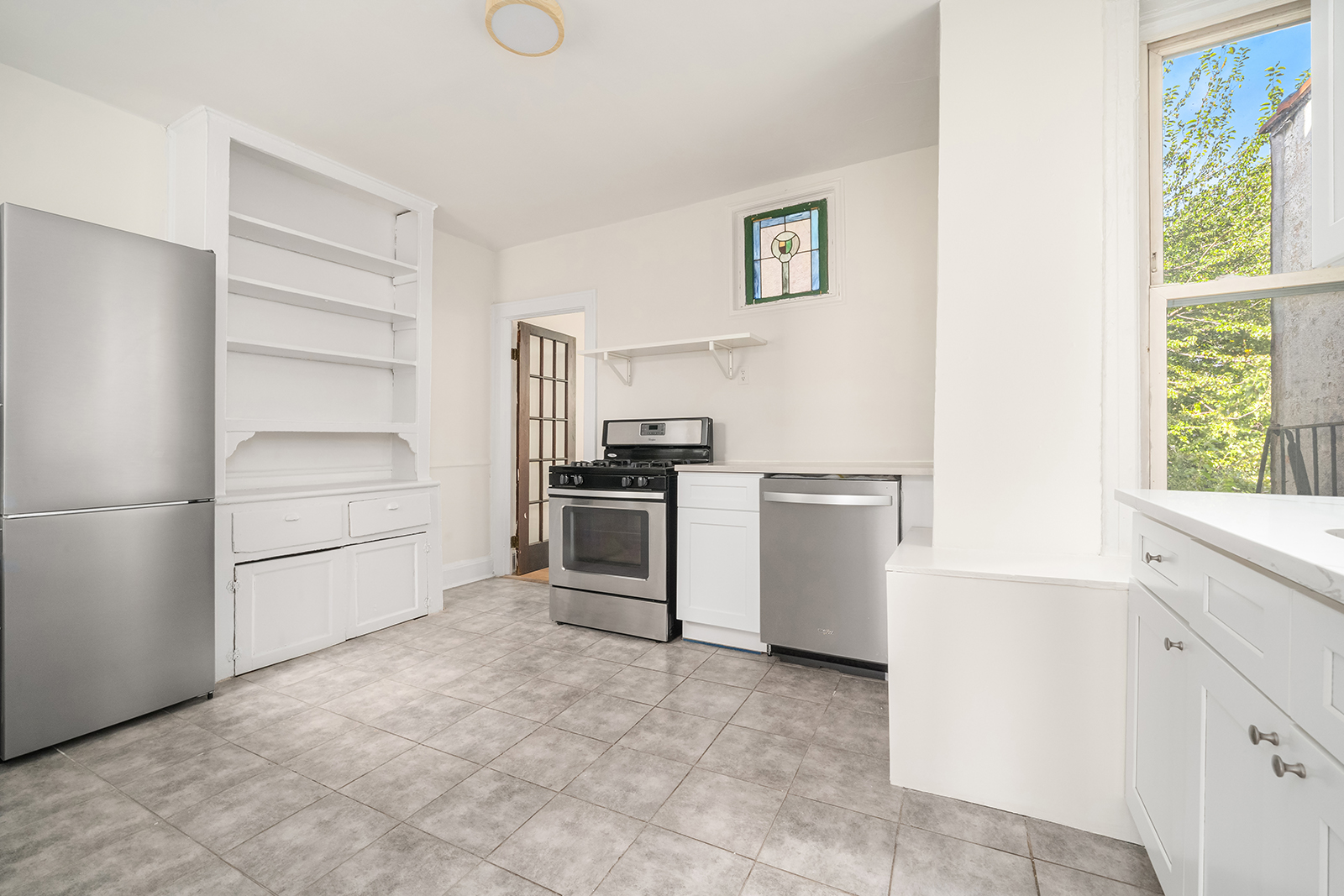439 Union Street, Unit 3 Brooklyn, NY 11231 - Photo 6 of 9 a view of cabinets and window