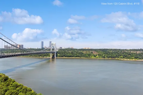 a view of a lake with a city