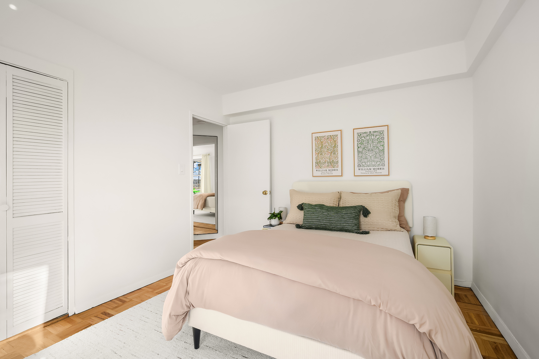 175 West 13th Street, Unit 19C Manhattan, NY 10011 - Photo 8 of 20 a bedroom with a bed and a window