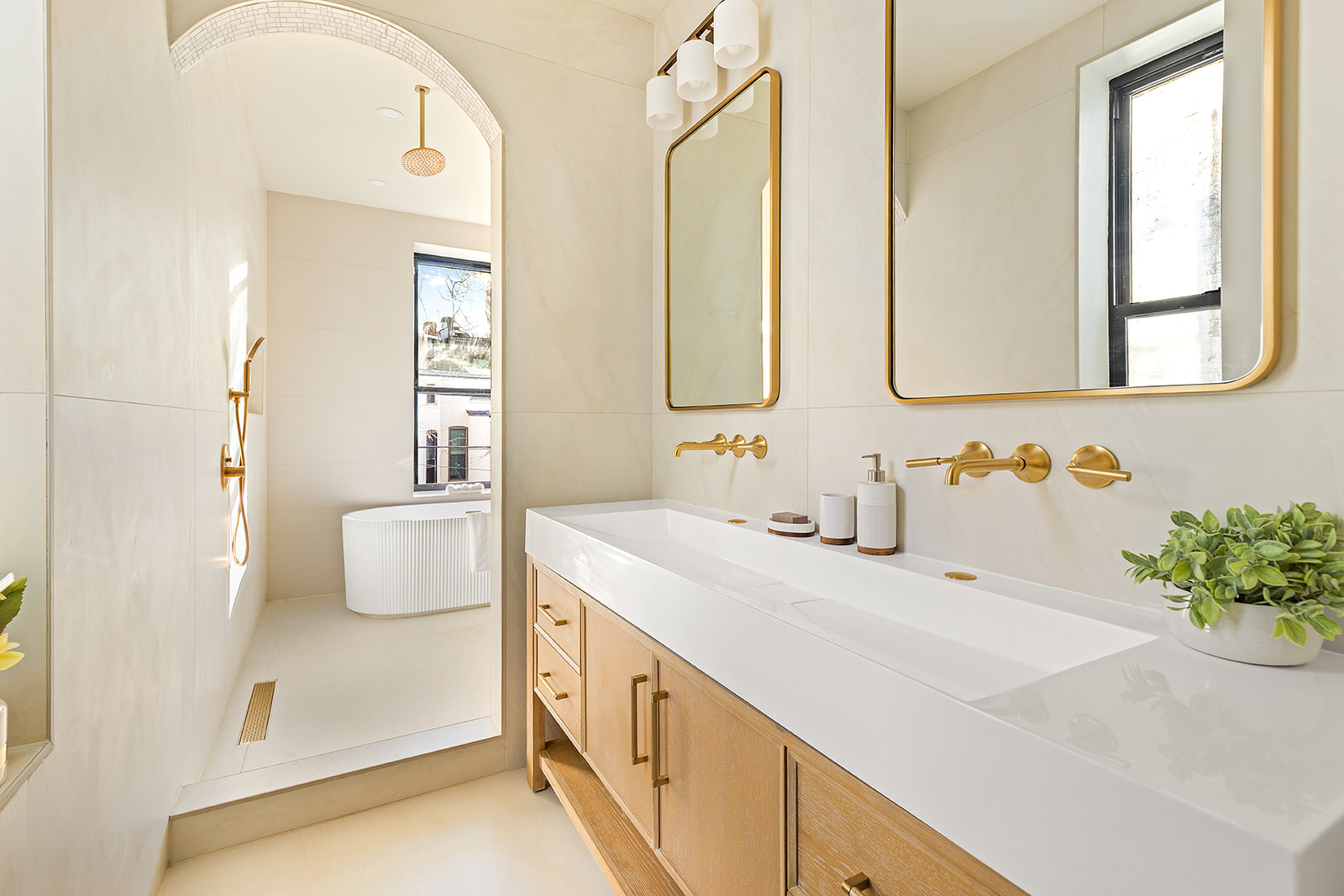 966 St Johns Place Brooklyn, NY 11213 - Photo 11 of 20 a bathroom with a sink and a mirror