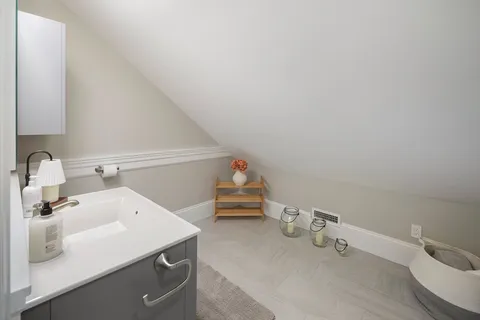 a utility room with a sink dryer and washer